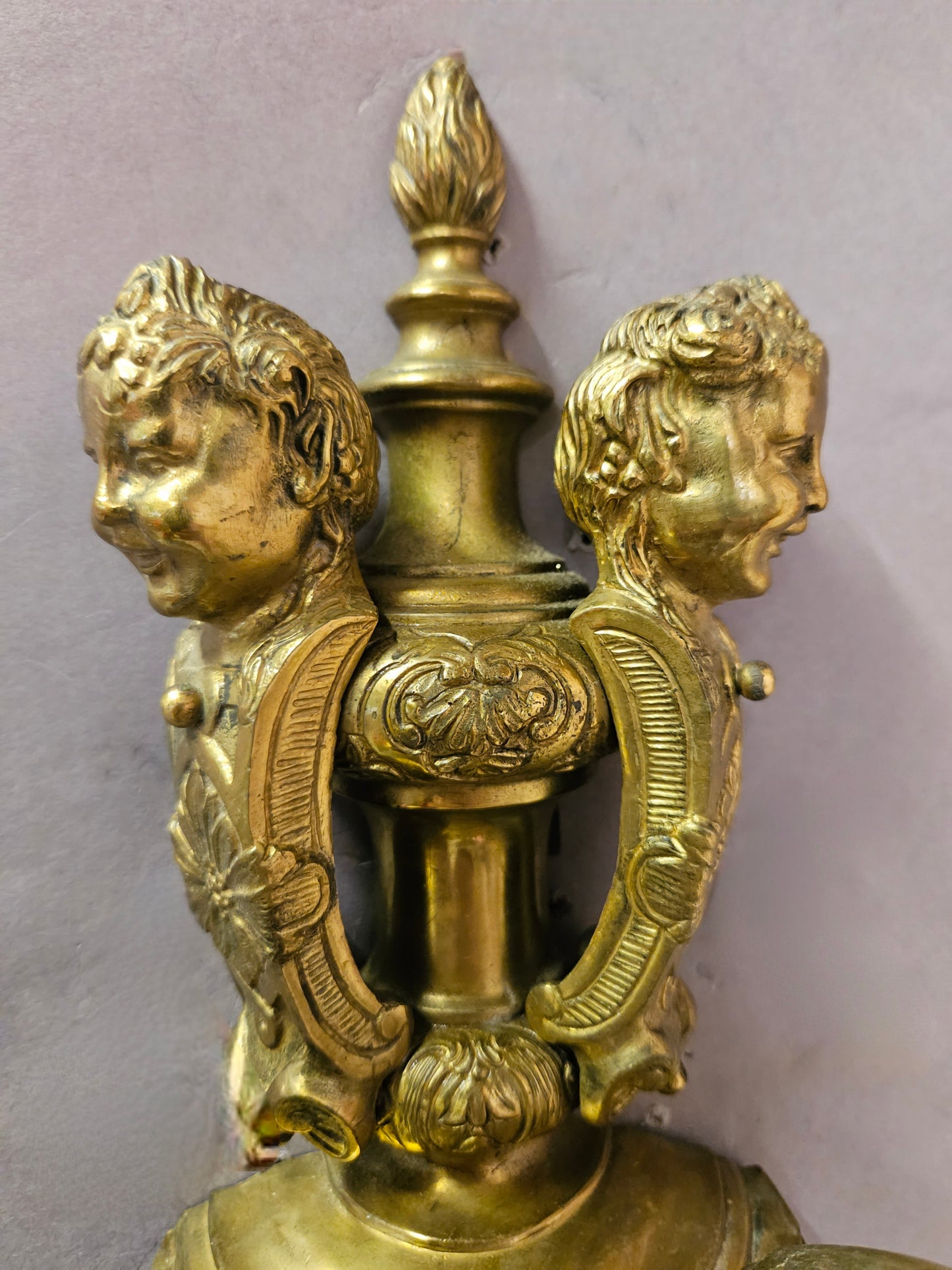 close up showing cherubs facing away 