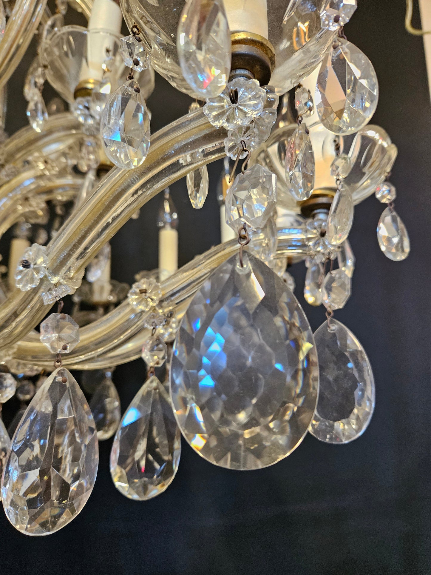 view of hanging pear drop from arm