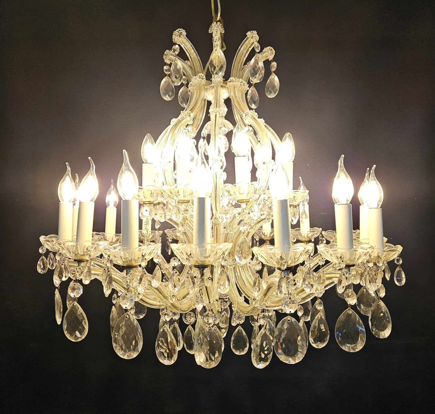 view from front of chandelier lit up