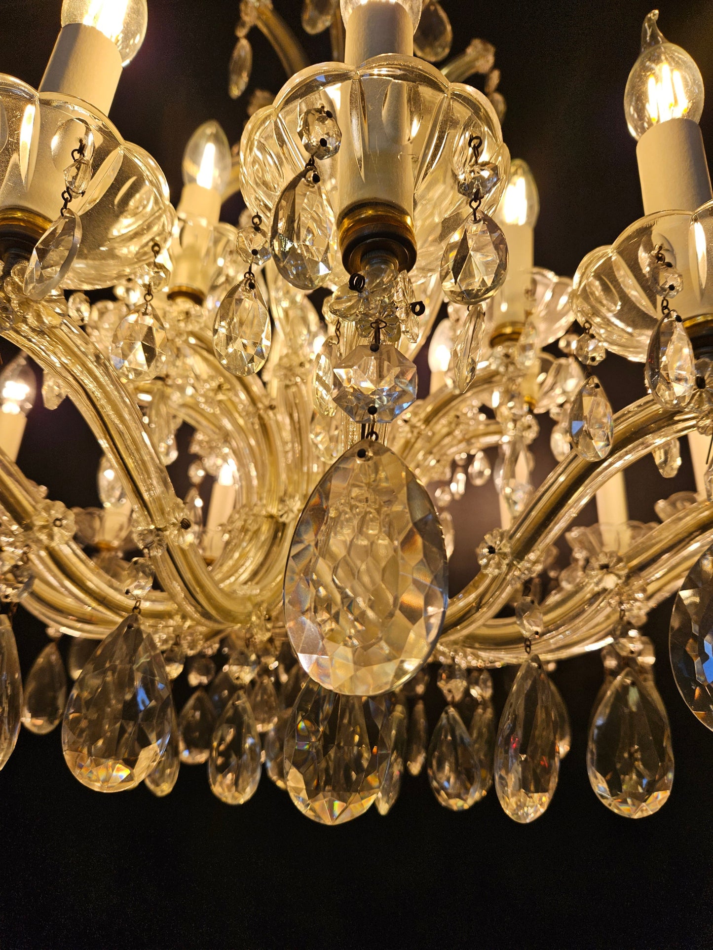 view from underneath with chandelier lit