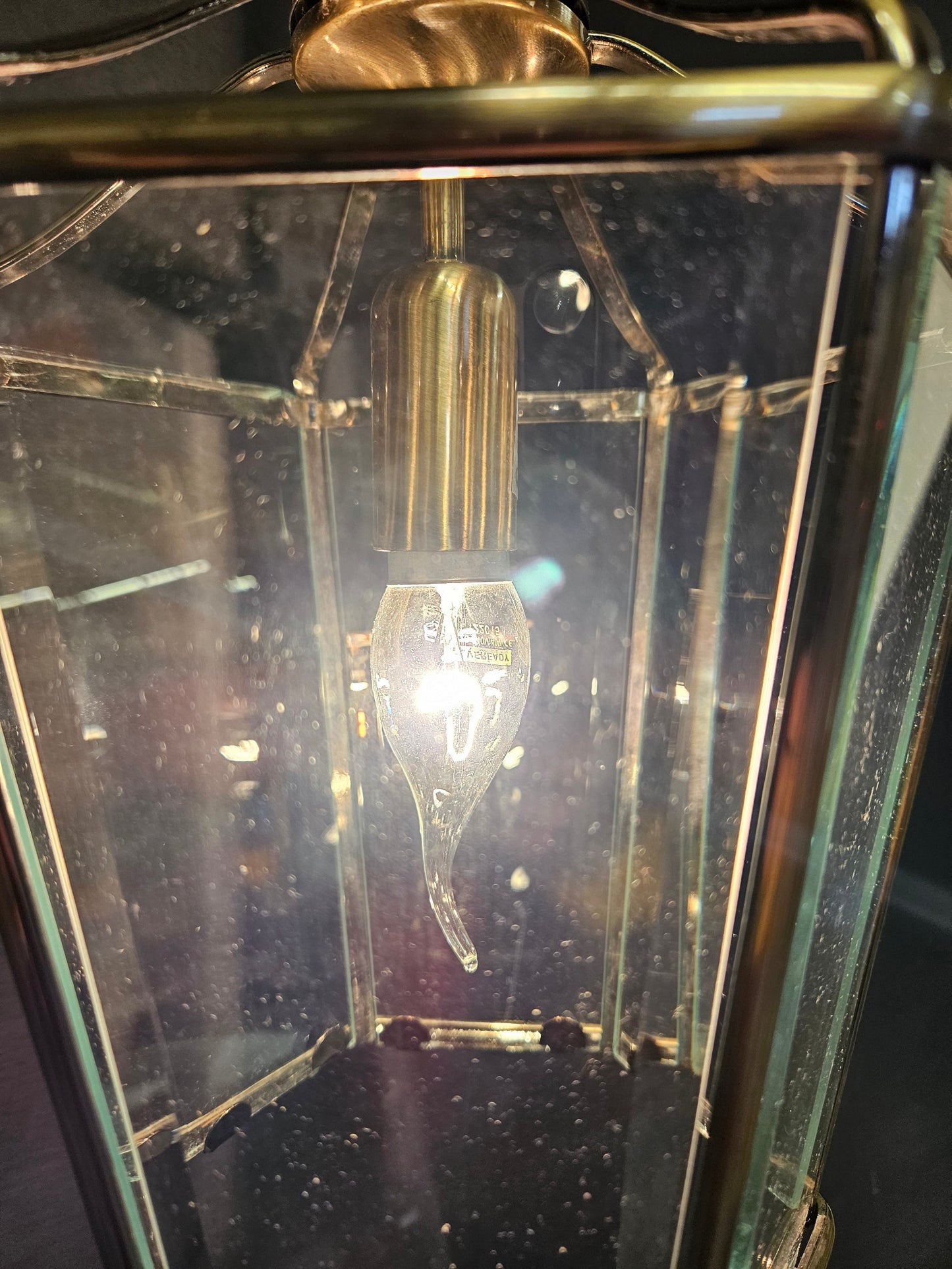 view of hanging light inside lantern