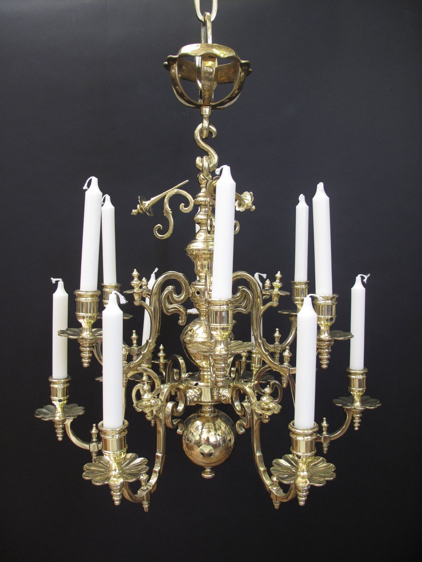 12 Arm Dutch Chandelier, polished and lacquered.