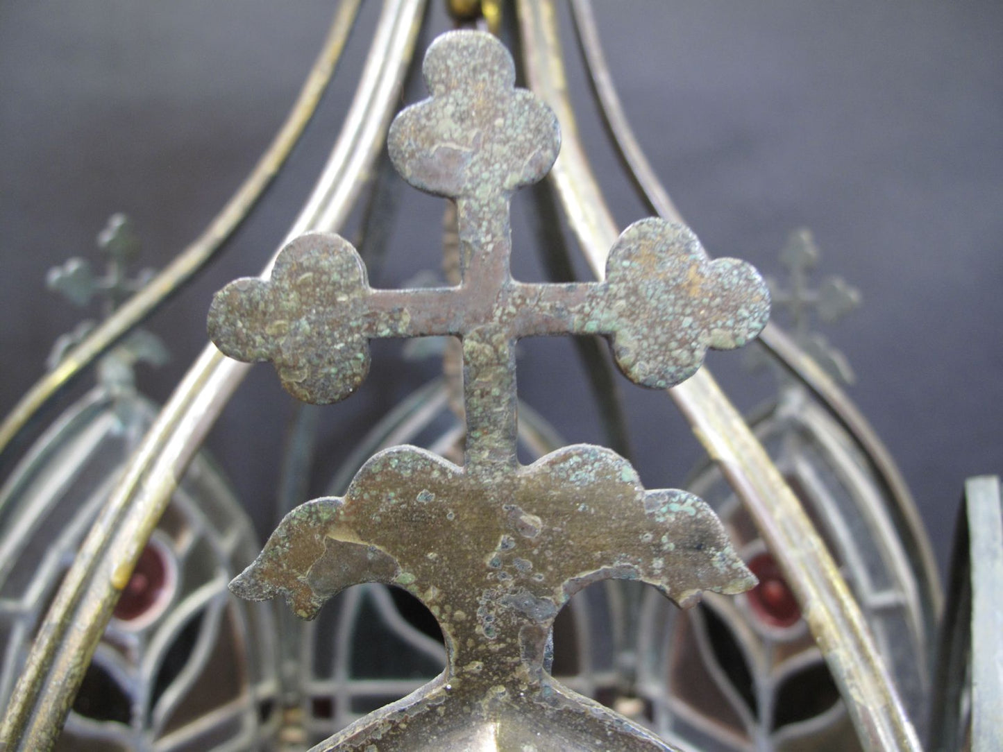 close up view of cross brass casting