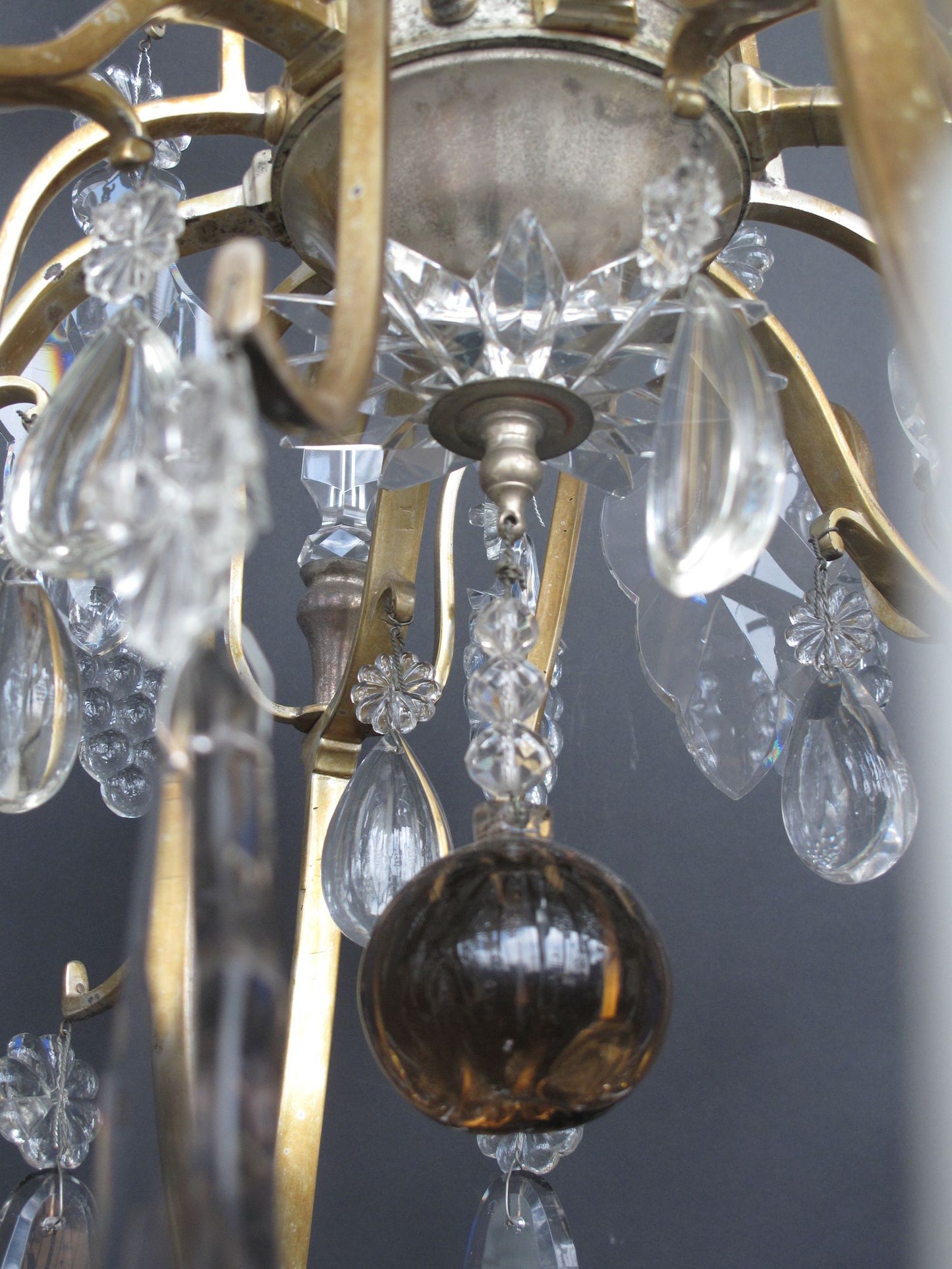 view of hanging fruit bubble at bottom of chandelier