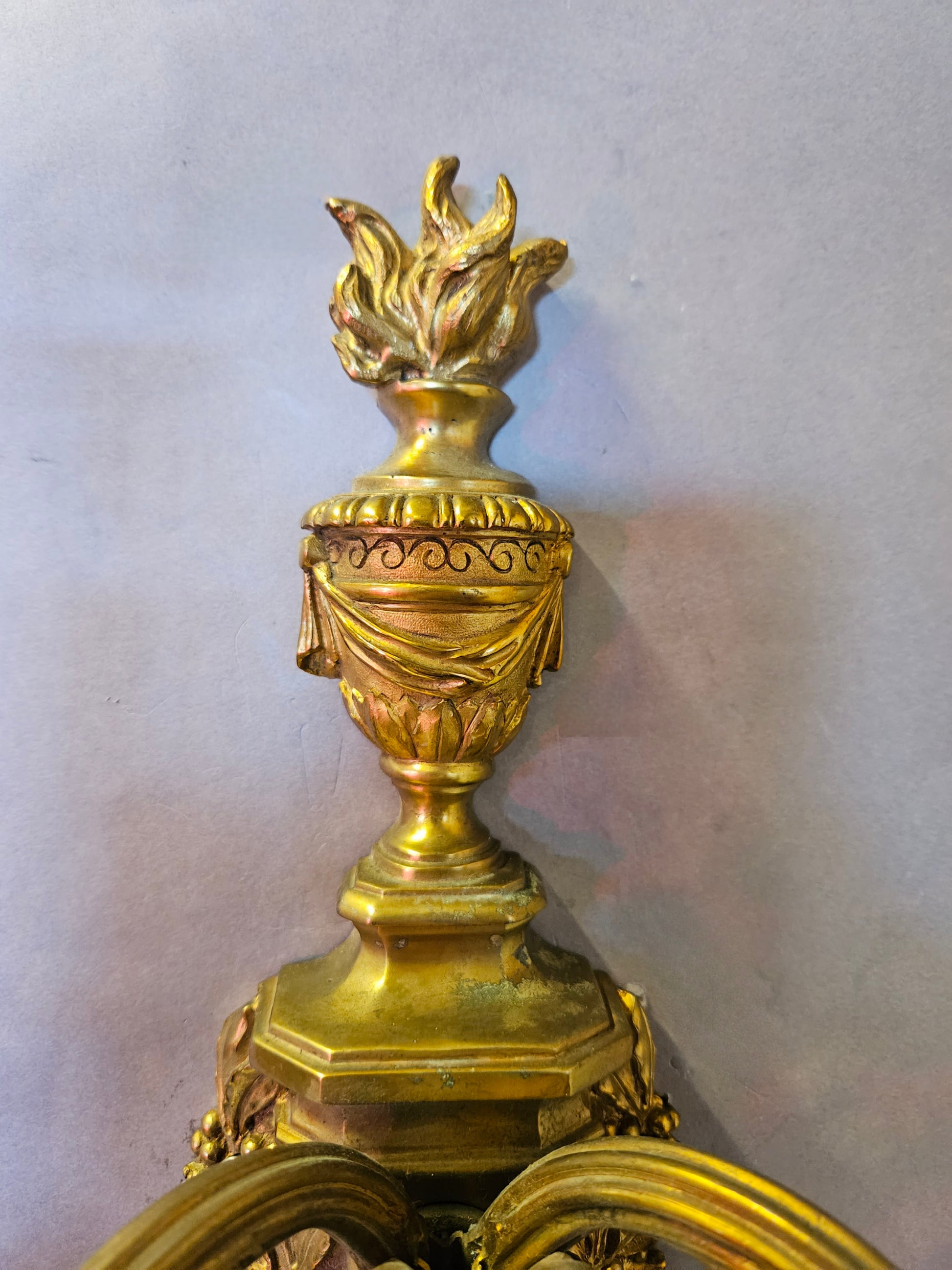 detailed view of top of wall light