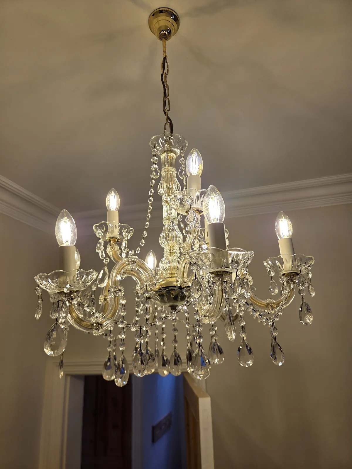 Detailed view of Maria Theresa chandelier glasswork following restoration.