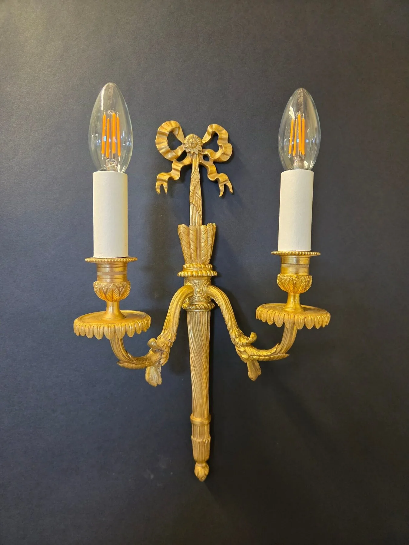 Pair Of 2-Arm Ormolu Wall Lights With Bow & Tassel, c. 1920 – view 1