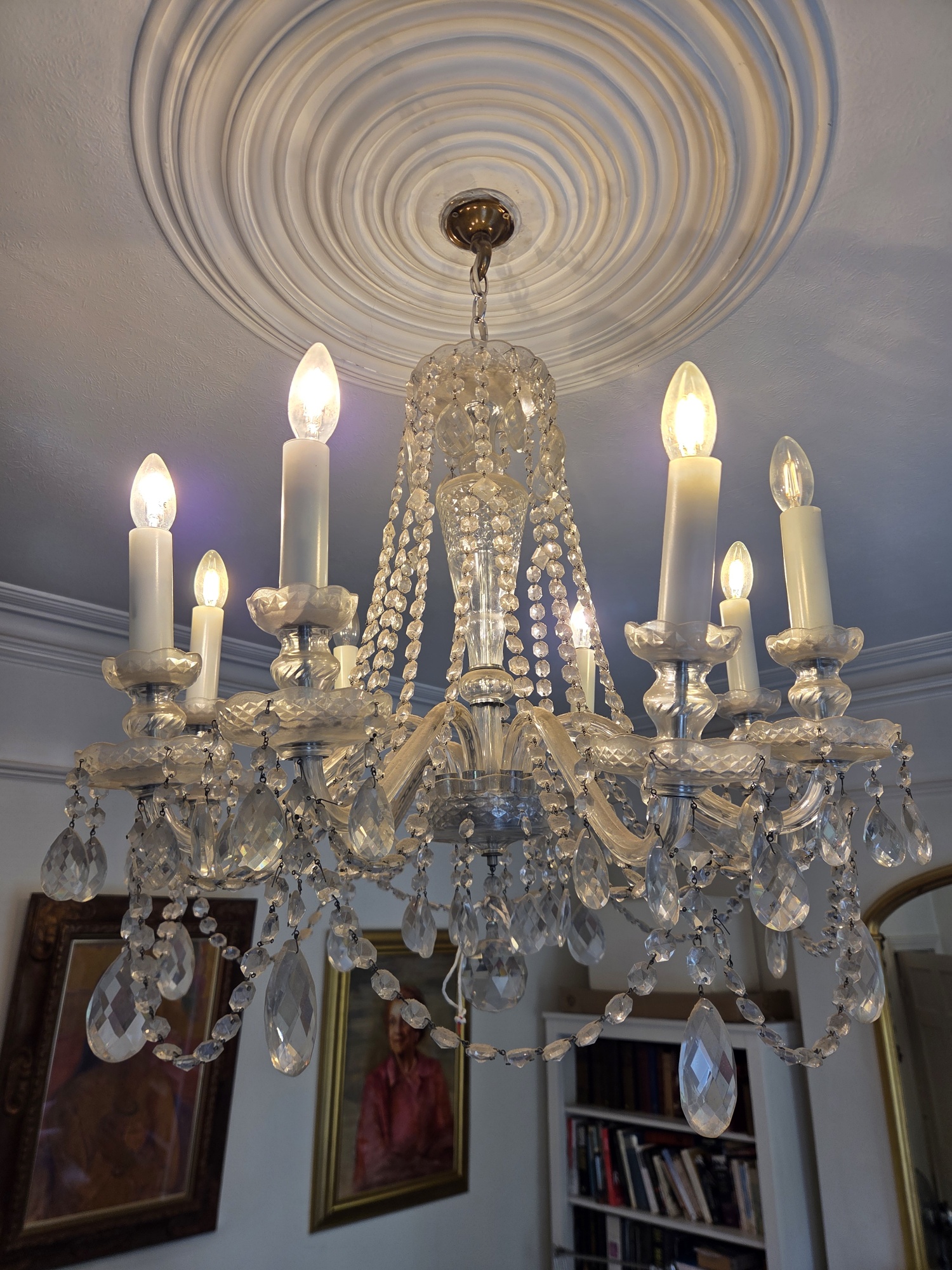 Eight-arm Czech chandelier in Hackney before cleaning.