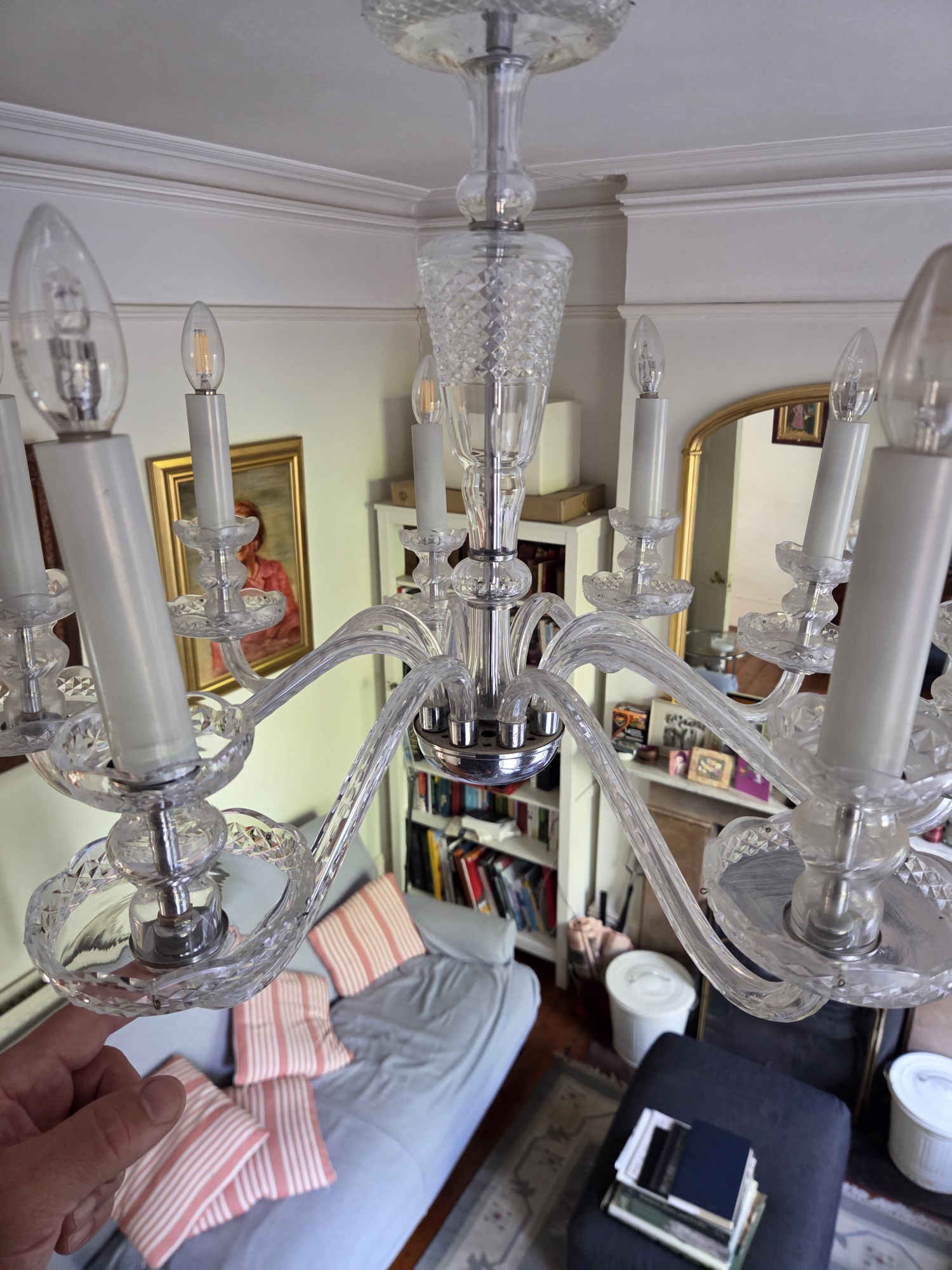Close view of the chandelier frame with its hanging glass removed.