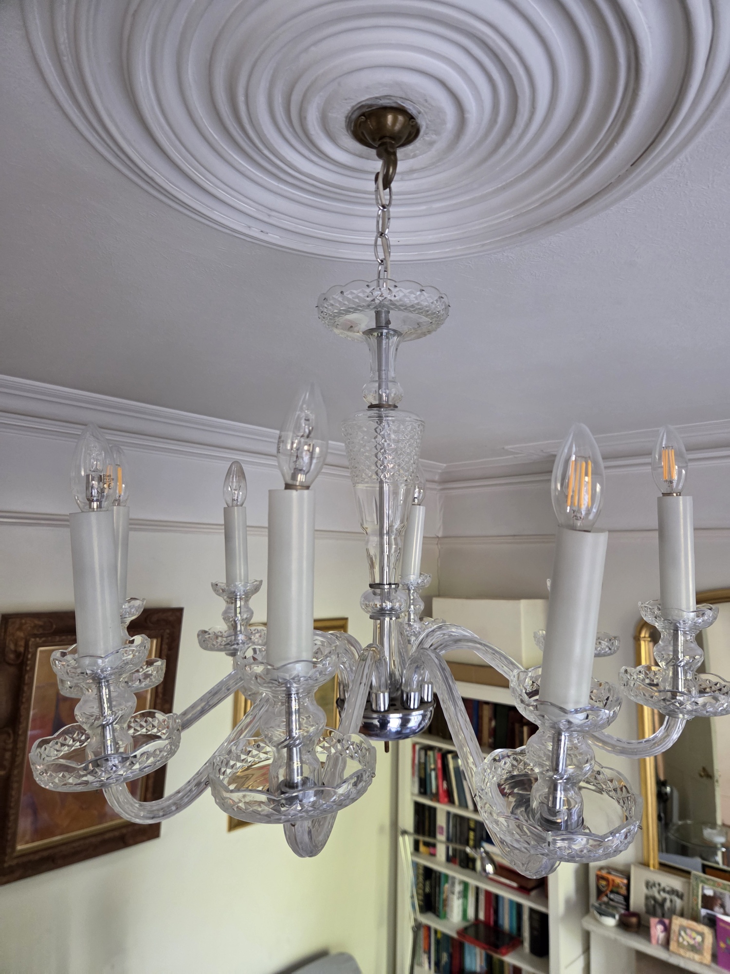 Cleaned chandelier frame before the hanging glass was reattached.