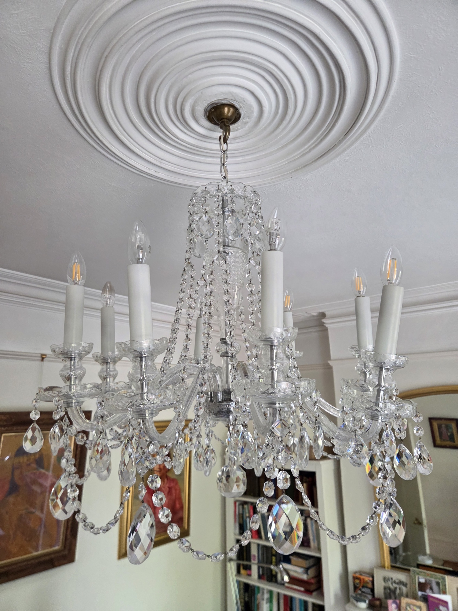 Eight-arm Czech chandelier after its cleaned glass was reattached.