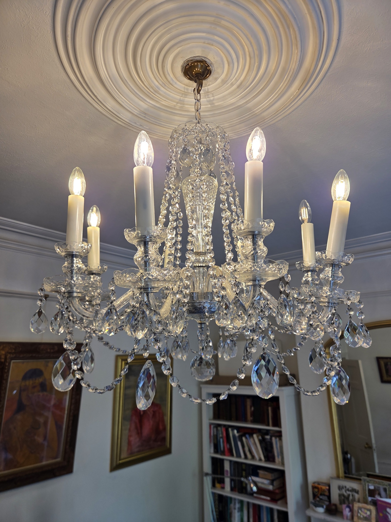 Eight-arm Czech chandelier in Hackney after cleaning and reassembly.