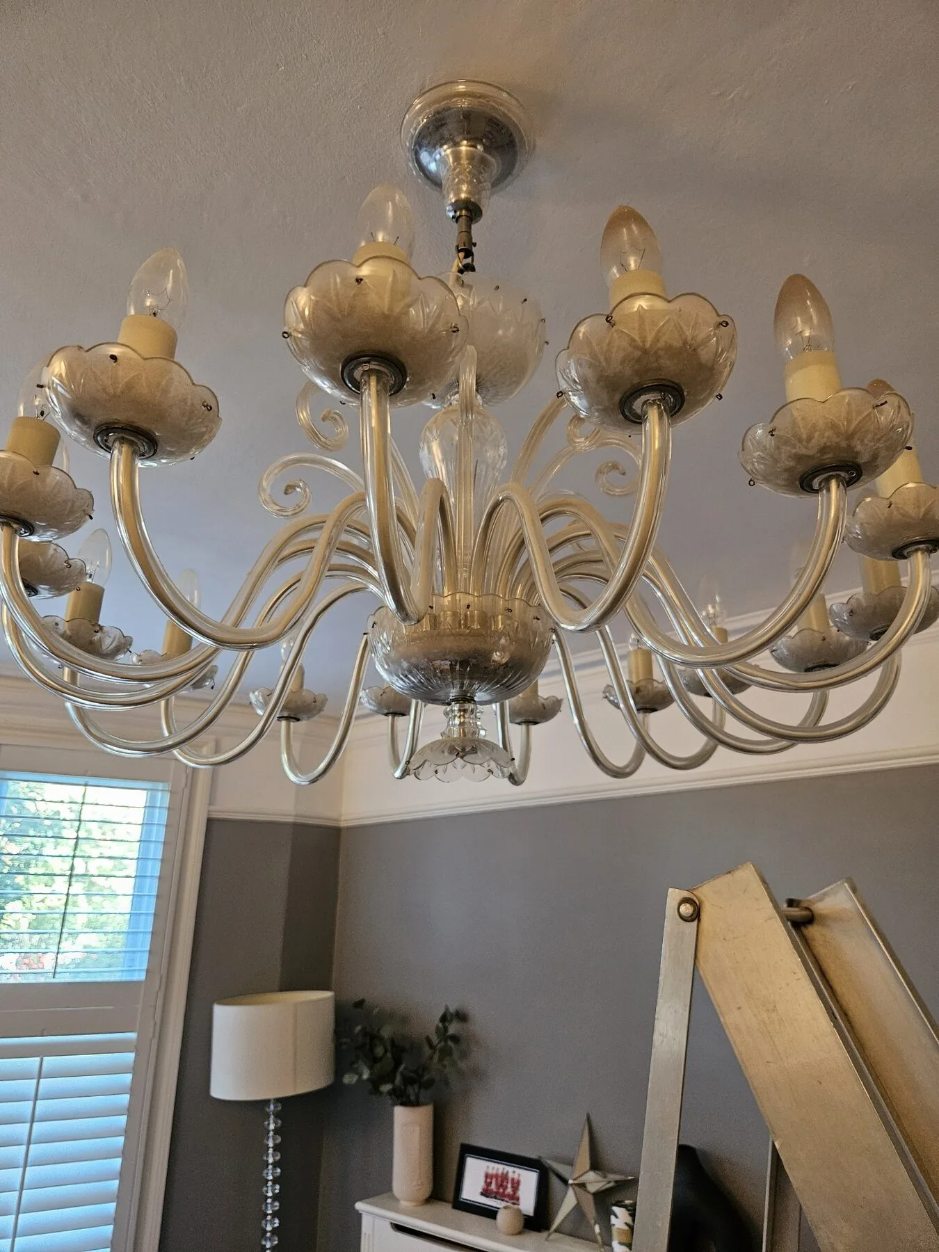 Large Murano-style glass chandelier documented in situ prior to dismantling