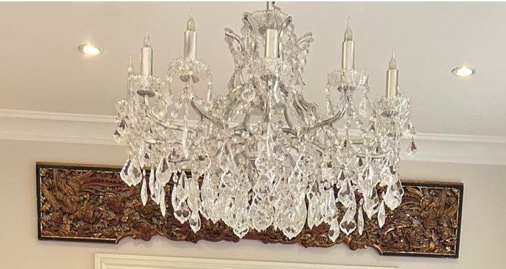 The chandelier hanging above the dining table before it fell.