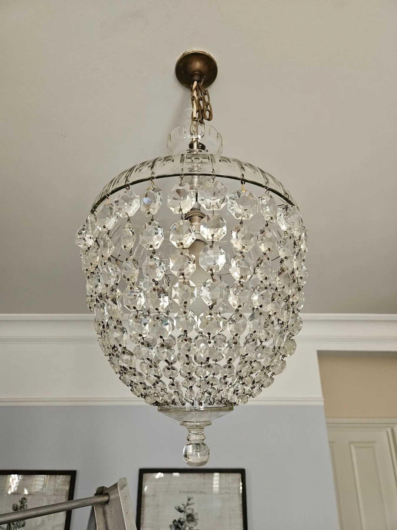 Crystal bag light chandelier cleaned in situ for a Chiswick residence