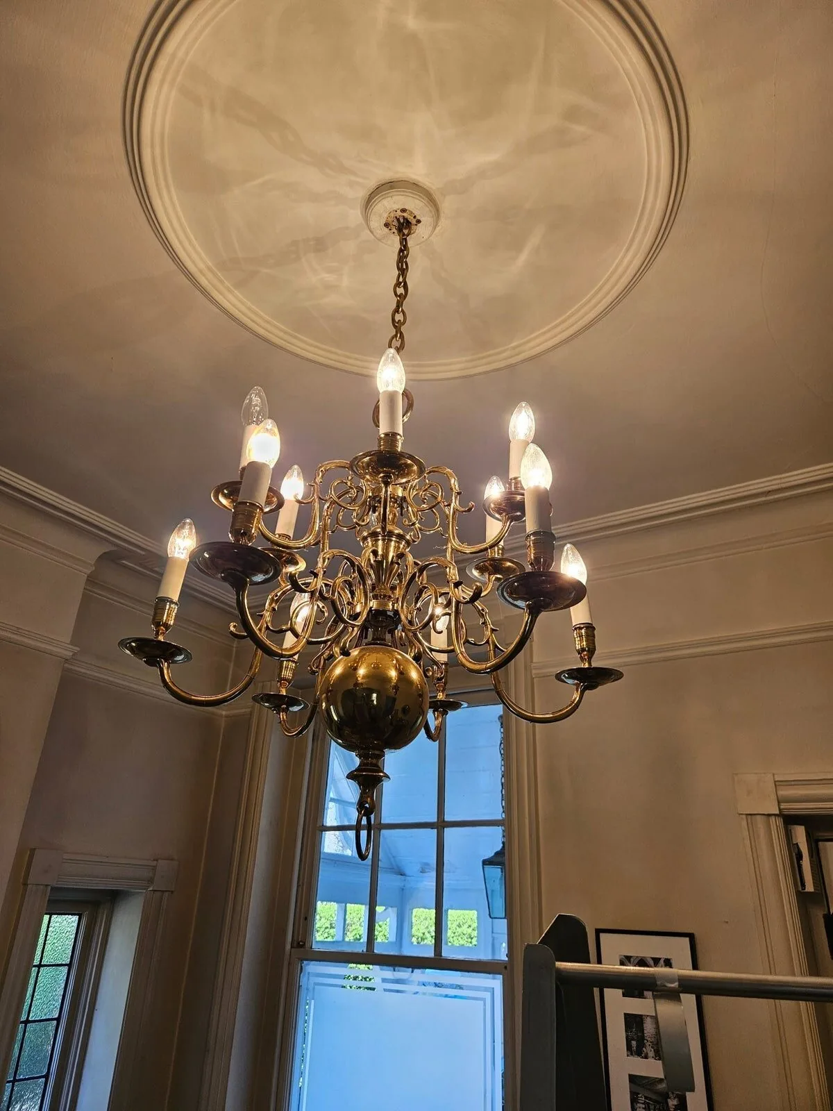 Dutch brass chandelier installed in a South West London residence