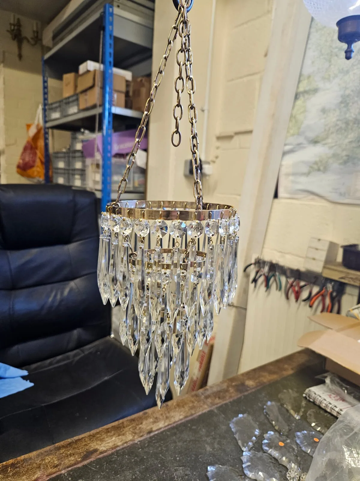 Small icicle chandelier under restoration at the G&P Cohn workshop