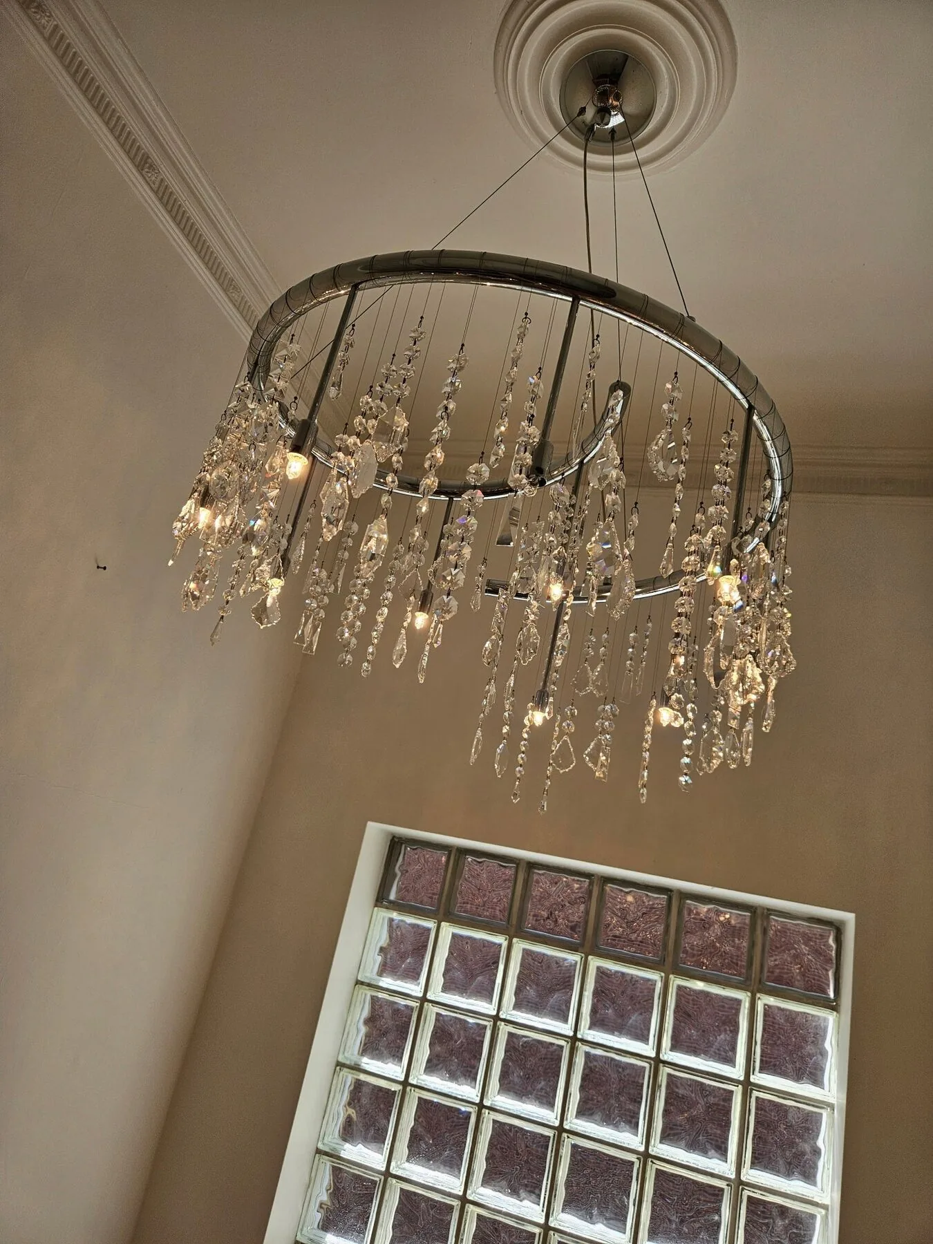 1980s chrome spiral chandelier above a stairwell in Kent