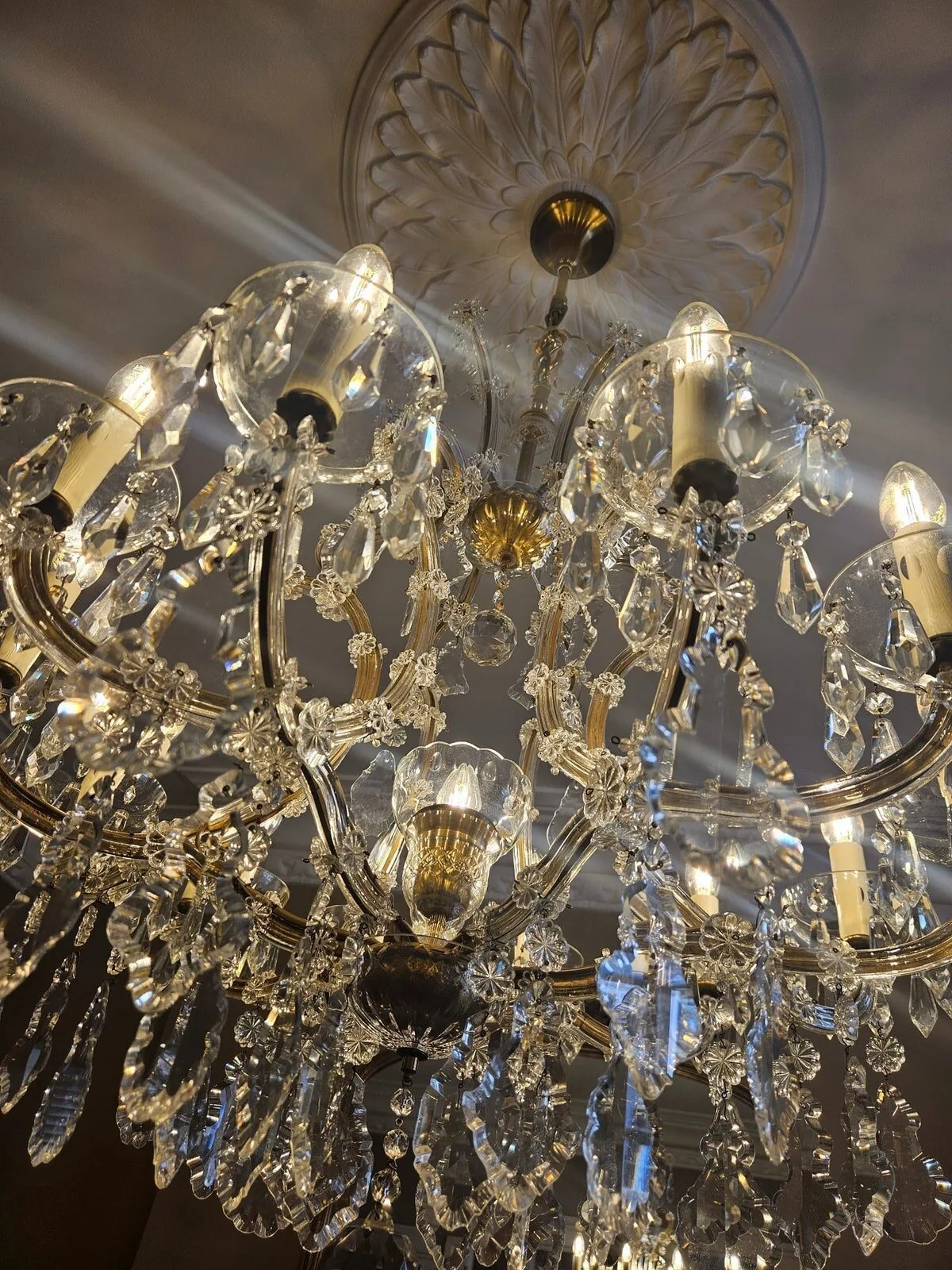 Maria Theresa chandelier following hand cleaning in Pimlico