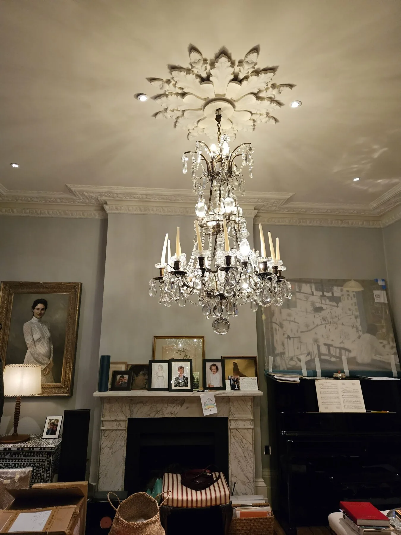 Family chandelier reinstalled and lit in the North Kensington residence