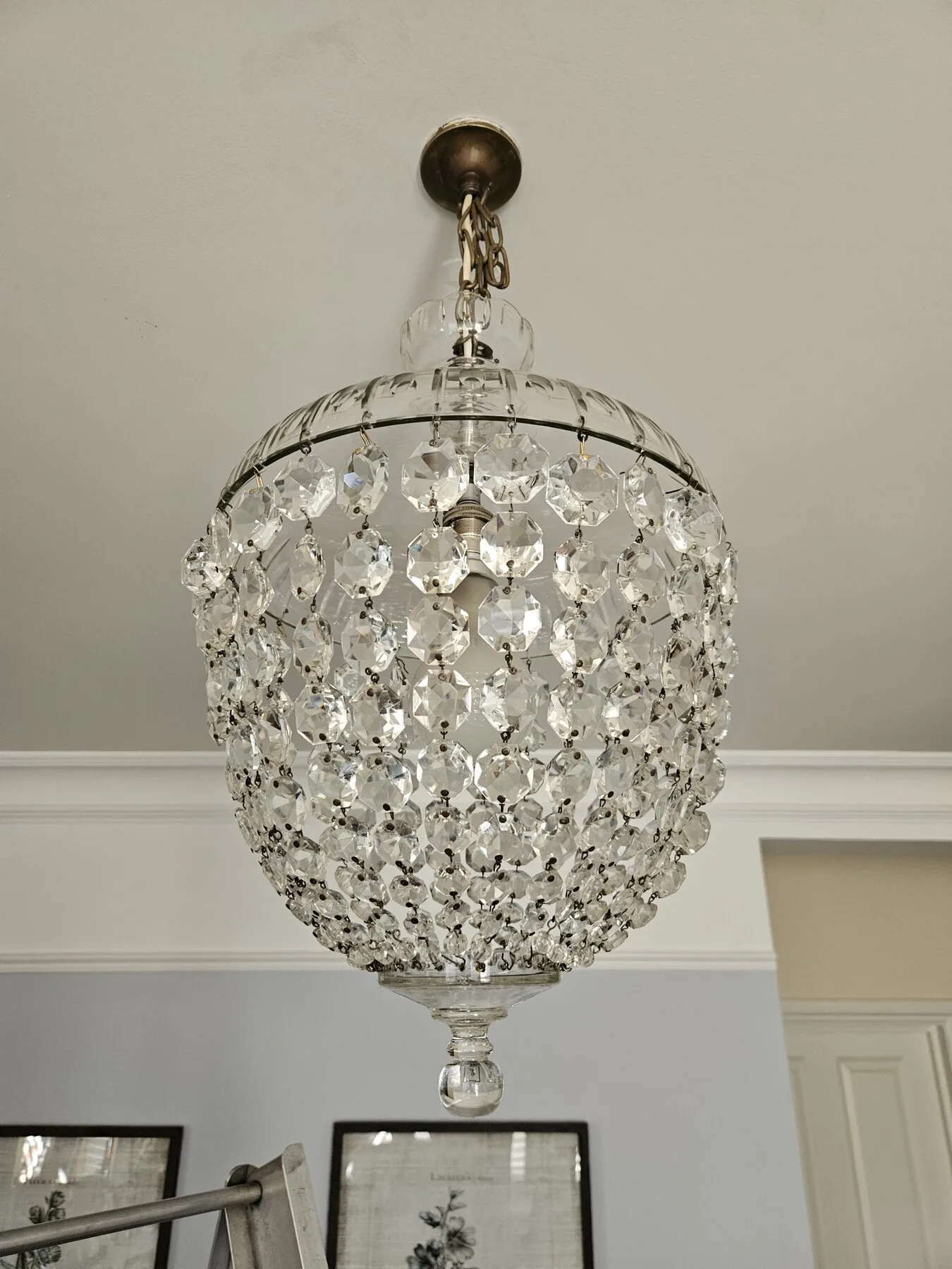The bag light with restored clarity, suspended from the original canopy