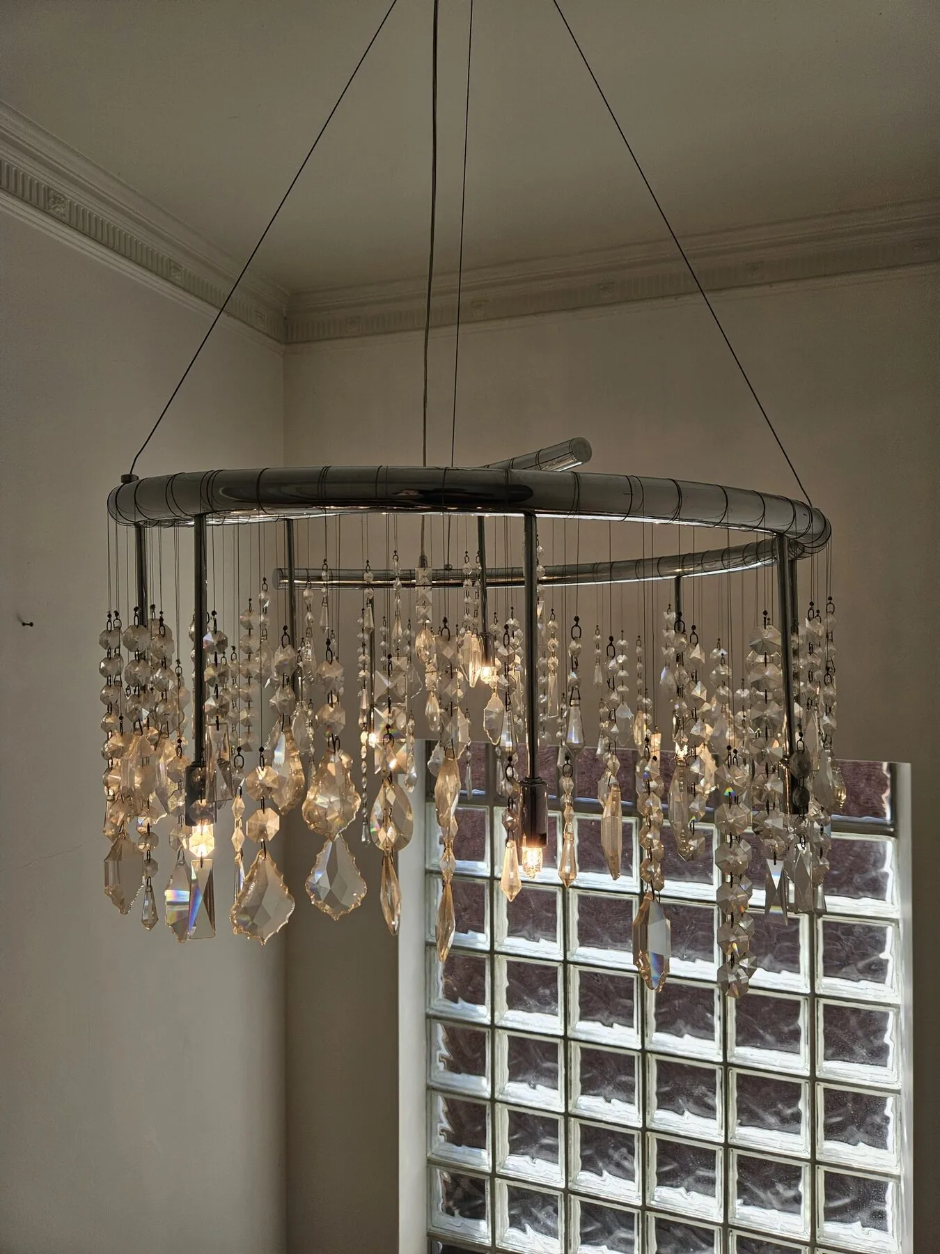 Chandelier illuminated during cleaning, Kent