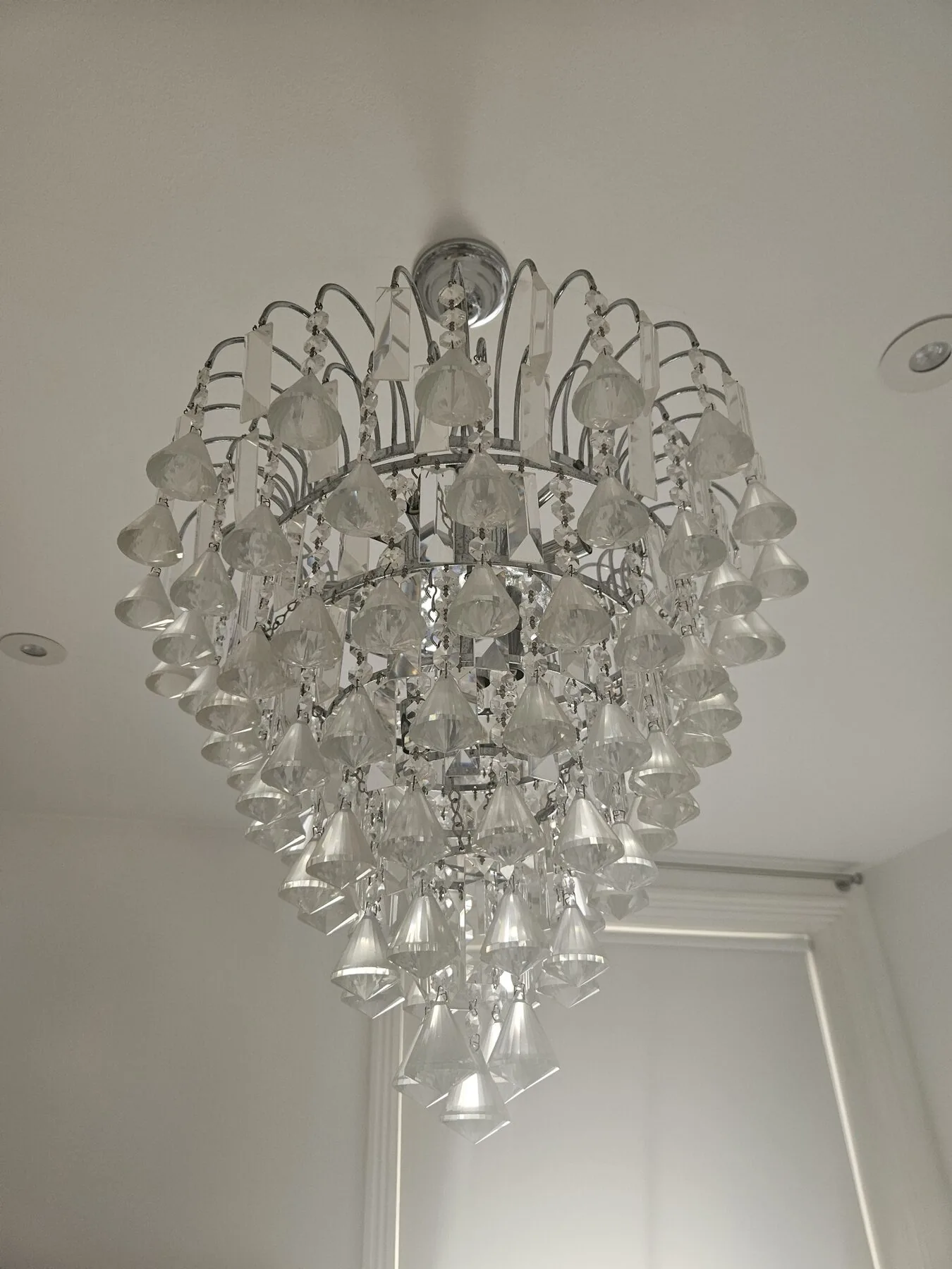 Tiered chandelier with graduated crystal teardrops, North London
