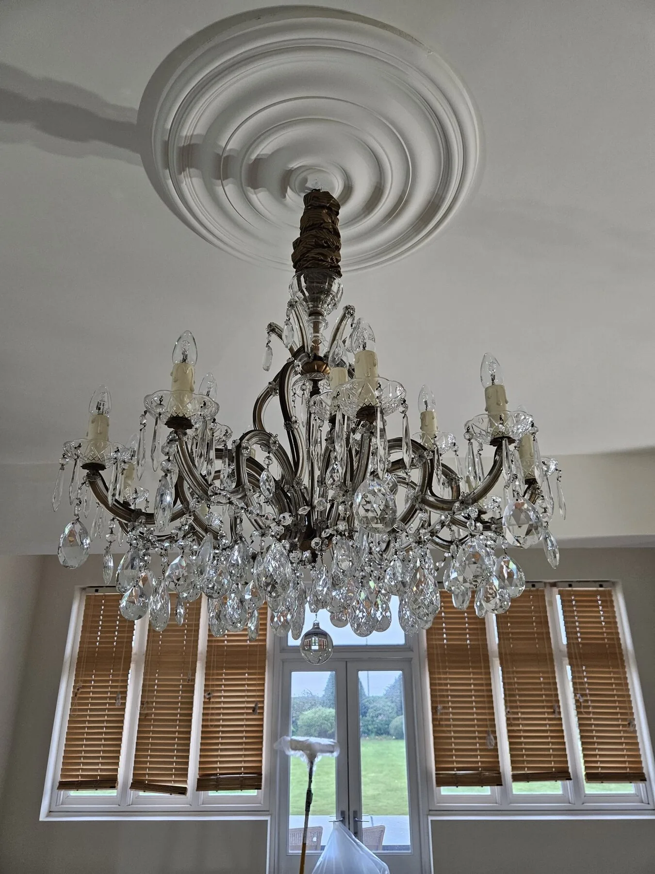 Marie Theresa crystal chandelier before cleaning in Southend residence