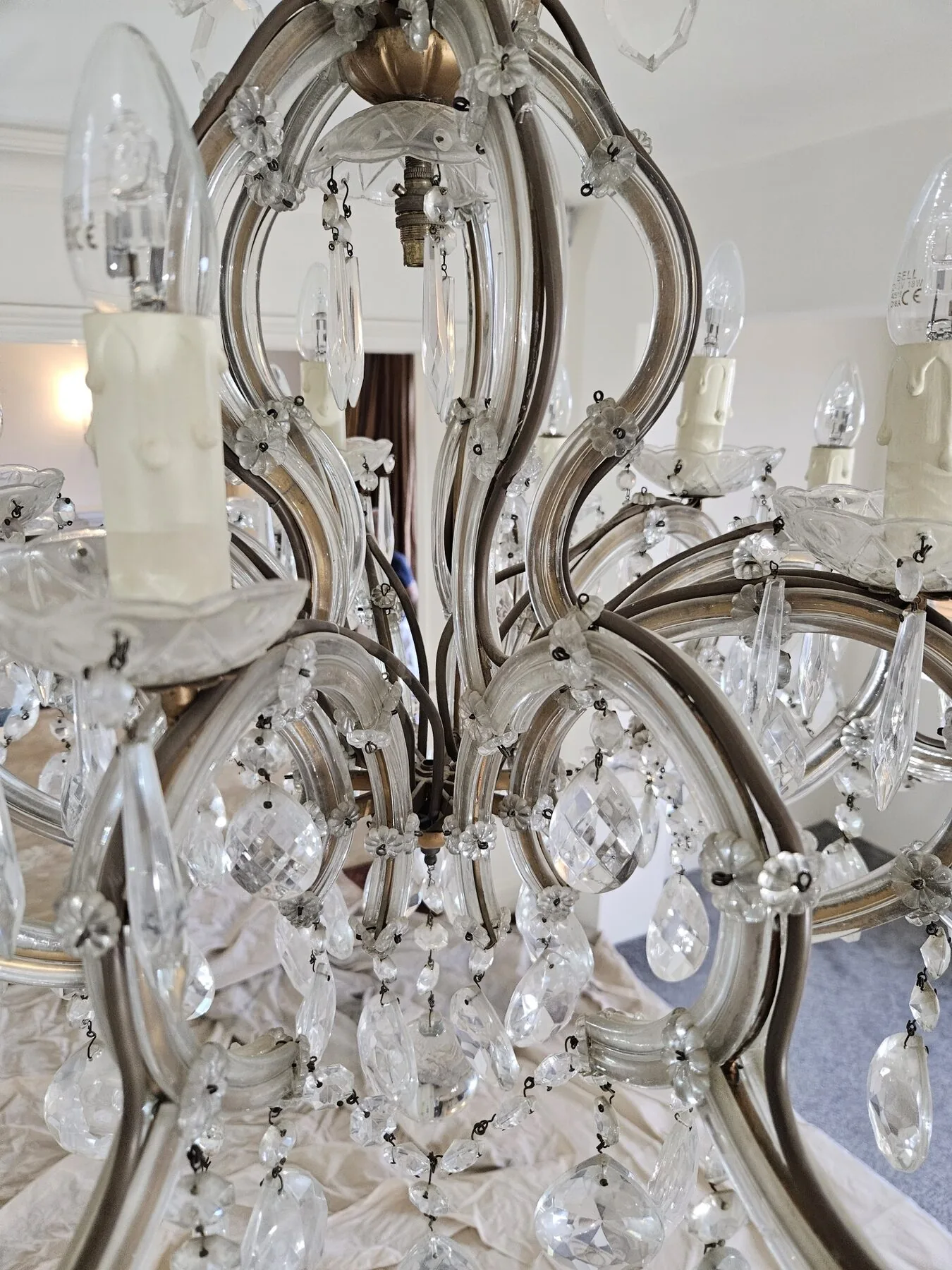 Side view of the tiered crystal chandelier with cut drops