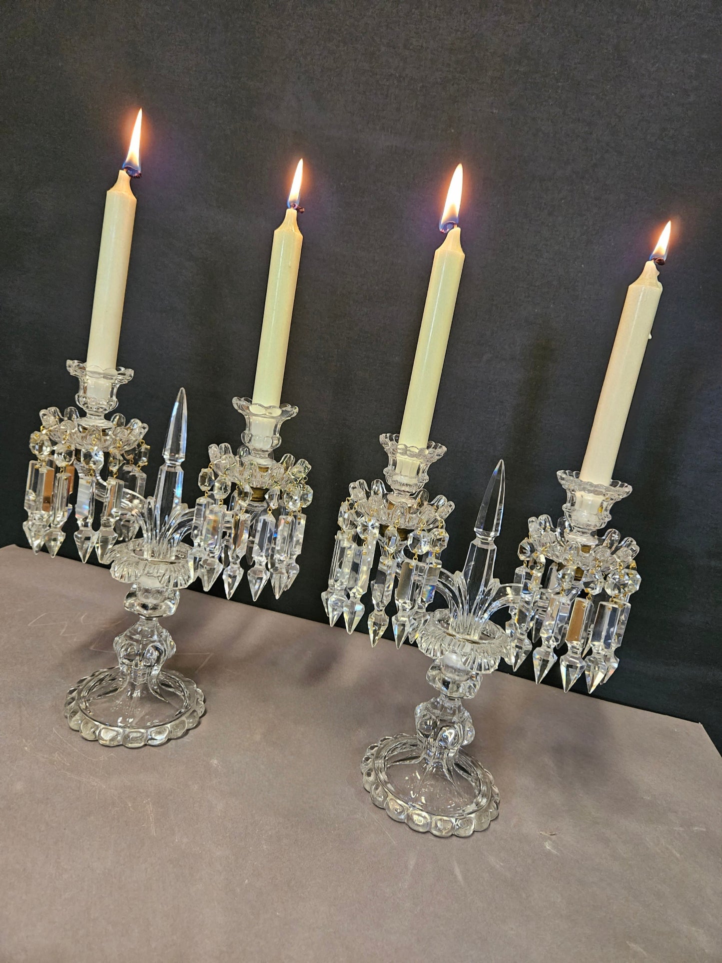 view of both candelabra lit from side