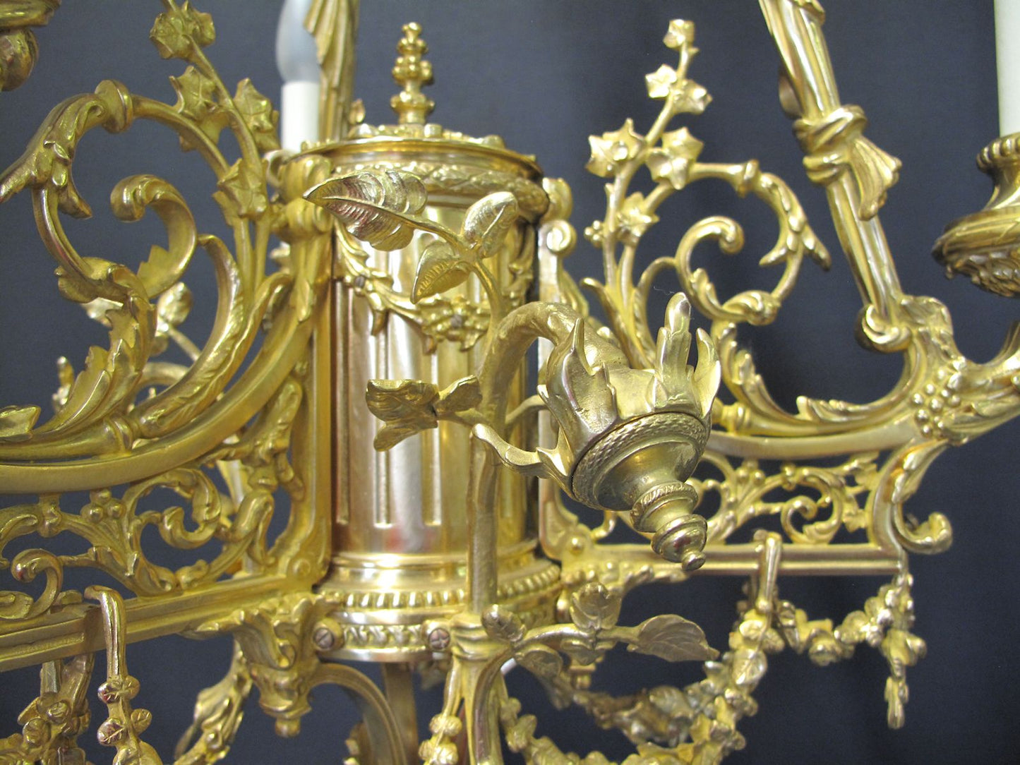 3 arm polished brass chandelier, showing fine detail