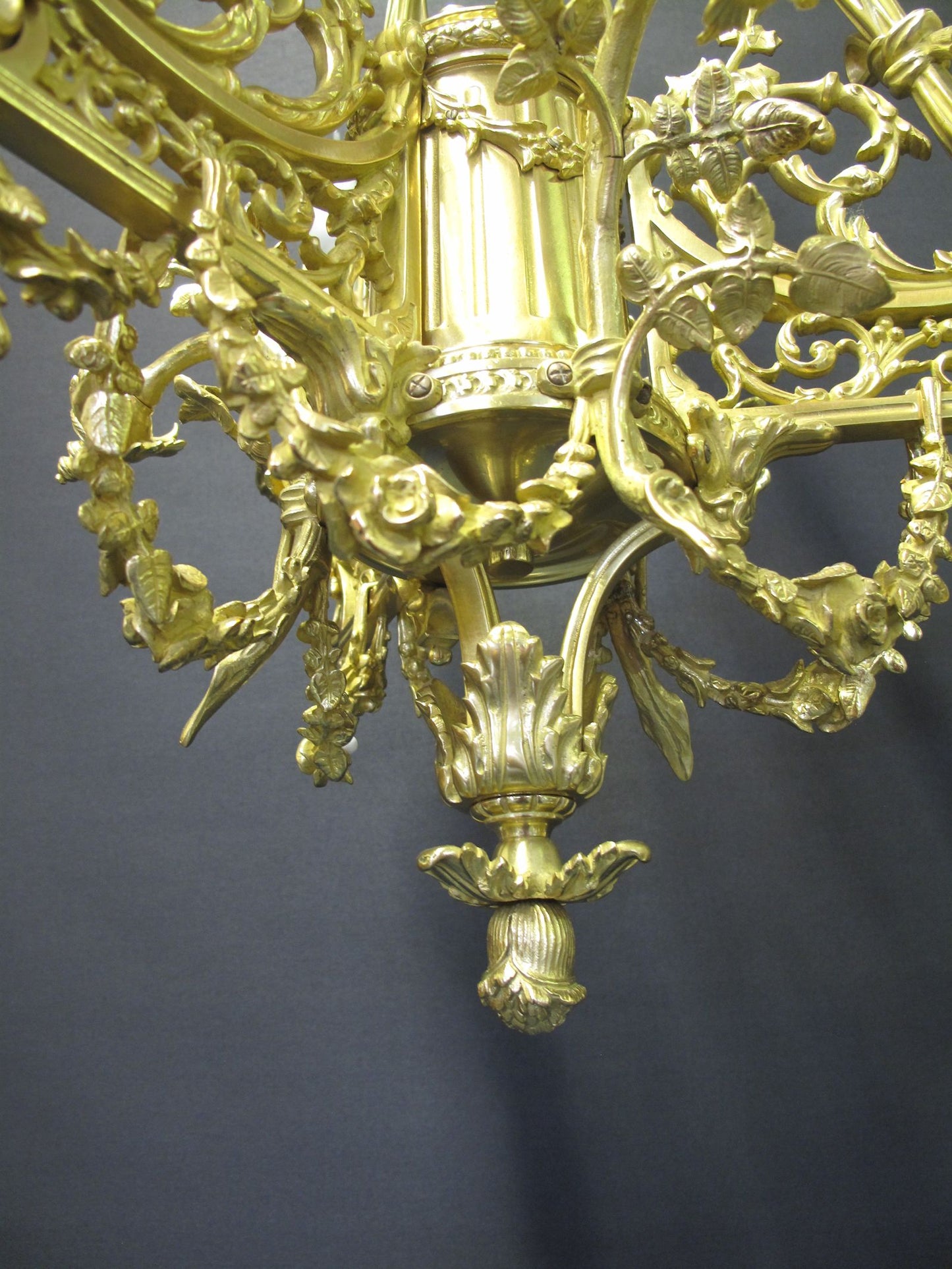3 arm polished brass chandelier, from underneath